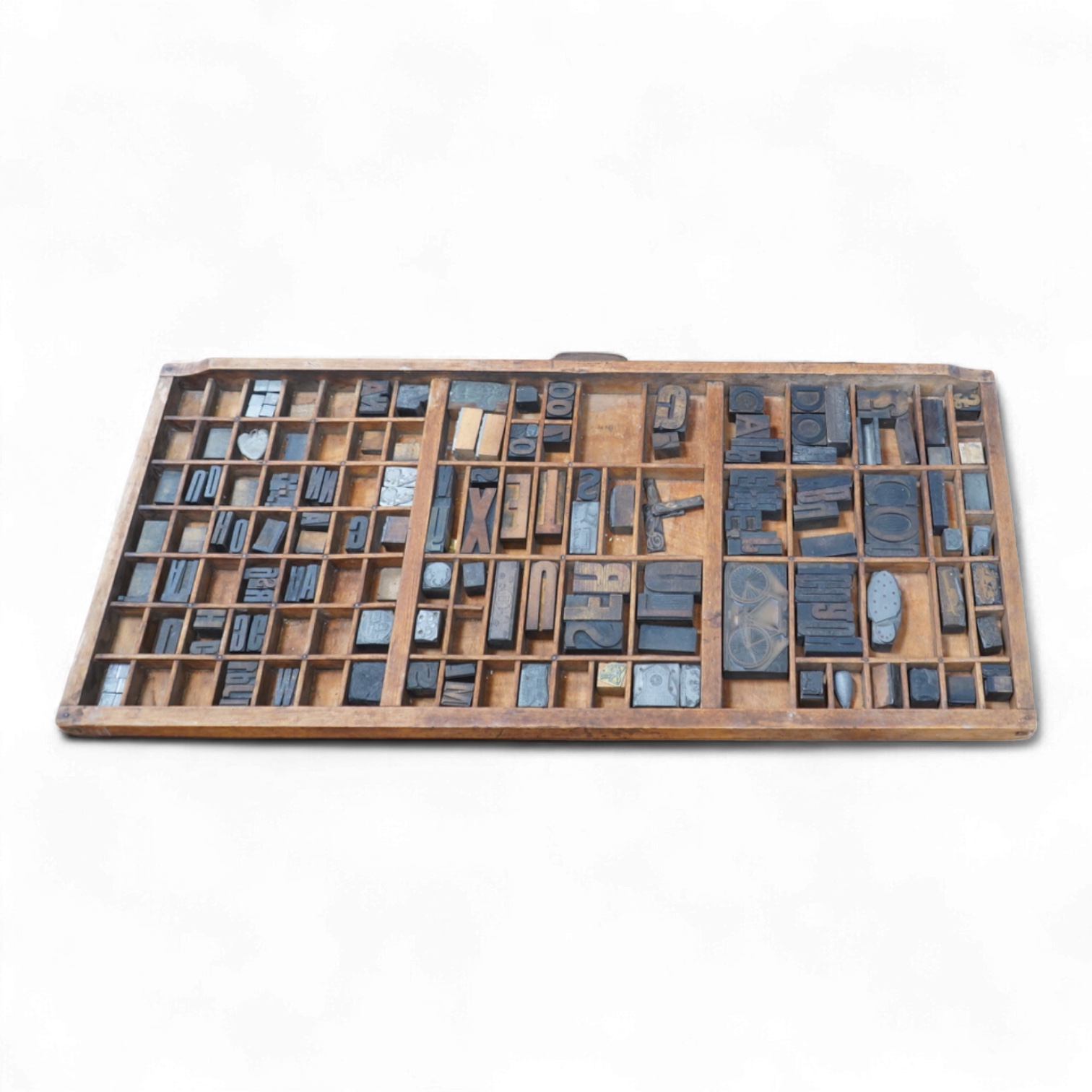 A printer's tray and various type-sets